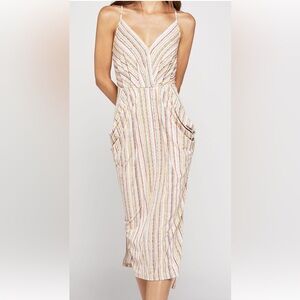 BCBGeneration sleeveless draped jersey dress w/pockets, elastic waist,side slits